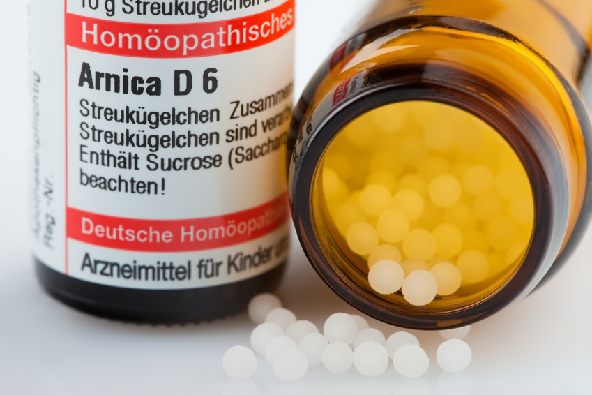 Flasche mit Arnica-Globuli Flasche mit Arnica-Globuli